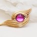 1980s Abstract Pin with Pink Cabochon and Rhinestones.