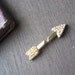 pearl and gold vintage arrow stick brooch sixties or fifties