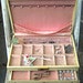 Vintage jewelry box with pink velvet interior, Mele brand, cream with gold details plus key