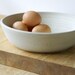 For bemebe - Set of four shallow bowls and four pottery mugs