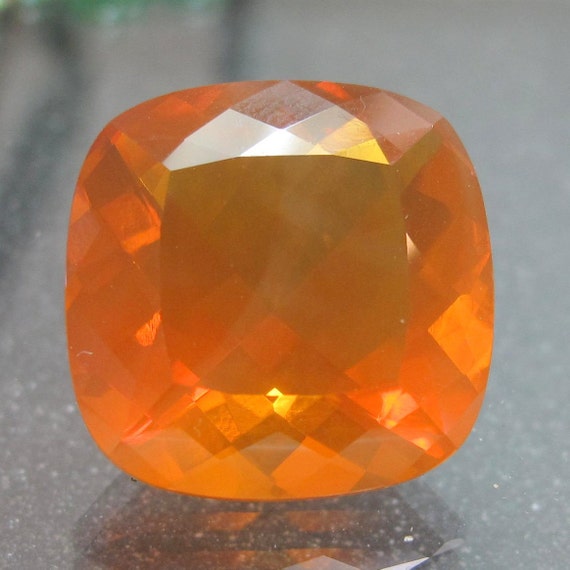 Faceted Oregon Fire Opal Gemstone by sparklequest on Etsy