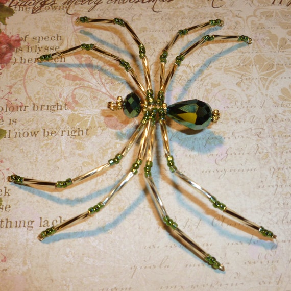 https://www.etsy.com/au/listing/117919964/iridescent-green-and-gold-beaded-spider?ref=sr_gallery_12&ga_search_query=spider+-spiderman&ga_order=most_relevant&ga_page=2&ga_search_type=all&ga_view_type=gallery