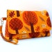 Clutch Wristlet with Flap and Removable Strap - Trees in Pumpkin Orange and Brown on Mustard Yellow