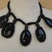 Cute embroidered and beaded applique black color