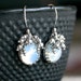 Handmade oxidized sterling silver earrings, opal Swarovski vintage glass cabochons, blue, bezel set earrings, Mimi Michele Jewelry