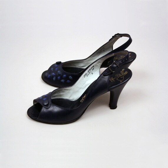 navy peep toe slingbacks