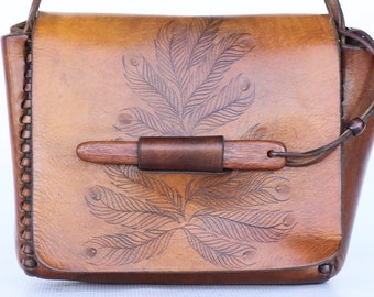 Beautiful hand made hand etched/tooled leather boho hippie shoulder bag. Very well made