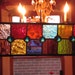 Stained glass suncatcher brilliantly colored with a flair of teal glass gems THINK CHRISTMAS GIFT