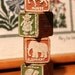 Reserved Listing of Raggedy Ann/Andy Blocks for Shirl - 4 Embossed Wooden Blocks