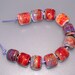 MAELSTROM Lampwork Beads by 3MusesGlass SRA Reds, blues, purples, maroons