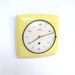 vintage mid century yellow wall clock