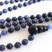 mala 108 beads - dumortierite with onyx, knotted