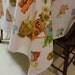 RESERVED -VINTAGE Table Cloth 1950s white with Kitchen items, fruit and vegetable print in orange, mustard yellow, olive green, turquoise
