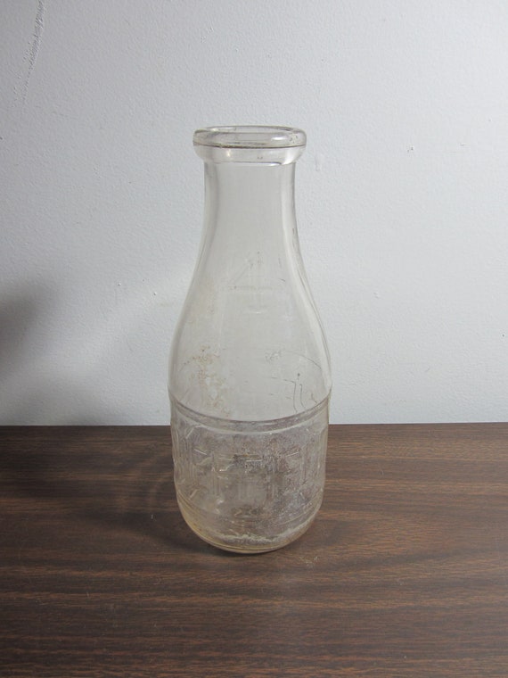 Items similar to Vintage Sheffield Farm 1QT Milk Bottle on Etsy