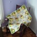 Price reduced Winnie the Pooh hand quilted baby quilt.