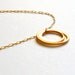 Barely there 14k gold circles nesting necklace - as seen on "The Mentalist"