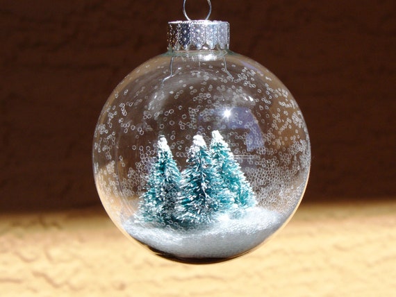 snow globe glass christmas ornament with an enchanted snowy snow globe glass christmas ornament with an enchanted snowy