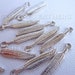 Bulk findings - Silver plated feather charms for jewelry making - earrings, necklaces, bracelets and more, 1 inch long, 30pieces / SP32-30