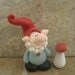 Garden Gnome in Blue and Red Topped Mushroom