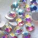 Crystal AB 2028 Swarovski Elements Rhinestones, 12ss Flat back 144 pieces