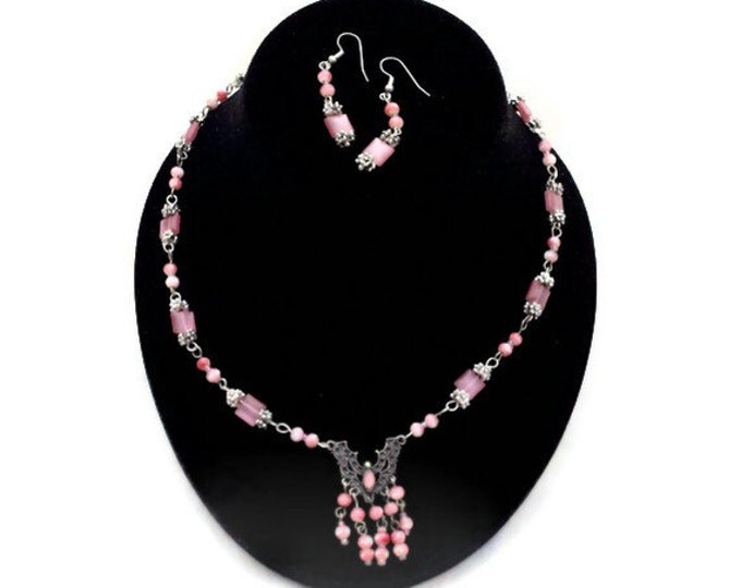 Pink fiber optic glass necklace and earrings made with upcycled beads and festoon beadwork earrings in silver plate