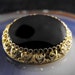 RESERVED Soapycakes: Alice Caviness Signed Brooch Sterling Vermeil Onyx