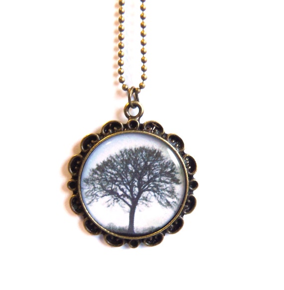 Items similar to Tree necklace with antique brass floral pendant base