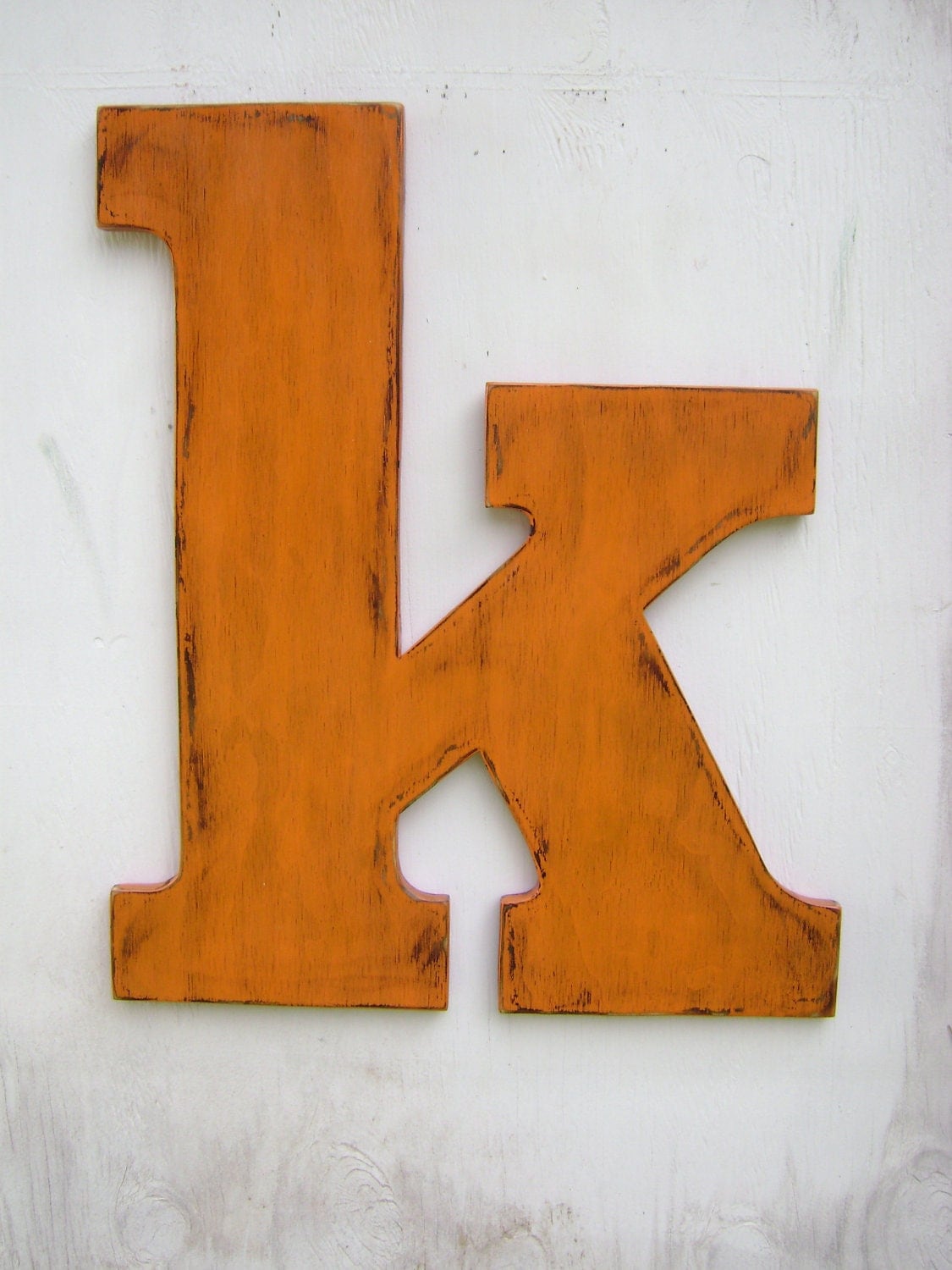 Large wooden lowercase letter k wedding decor