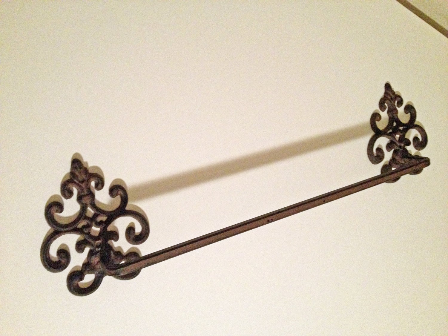 Vintage cast iron towel rack