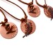 RESERVED FOR CATHLEEN // copper peace necklace // set of four