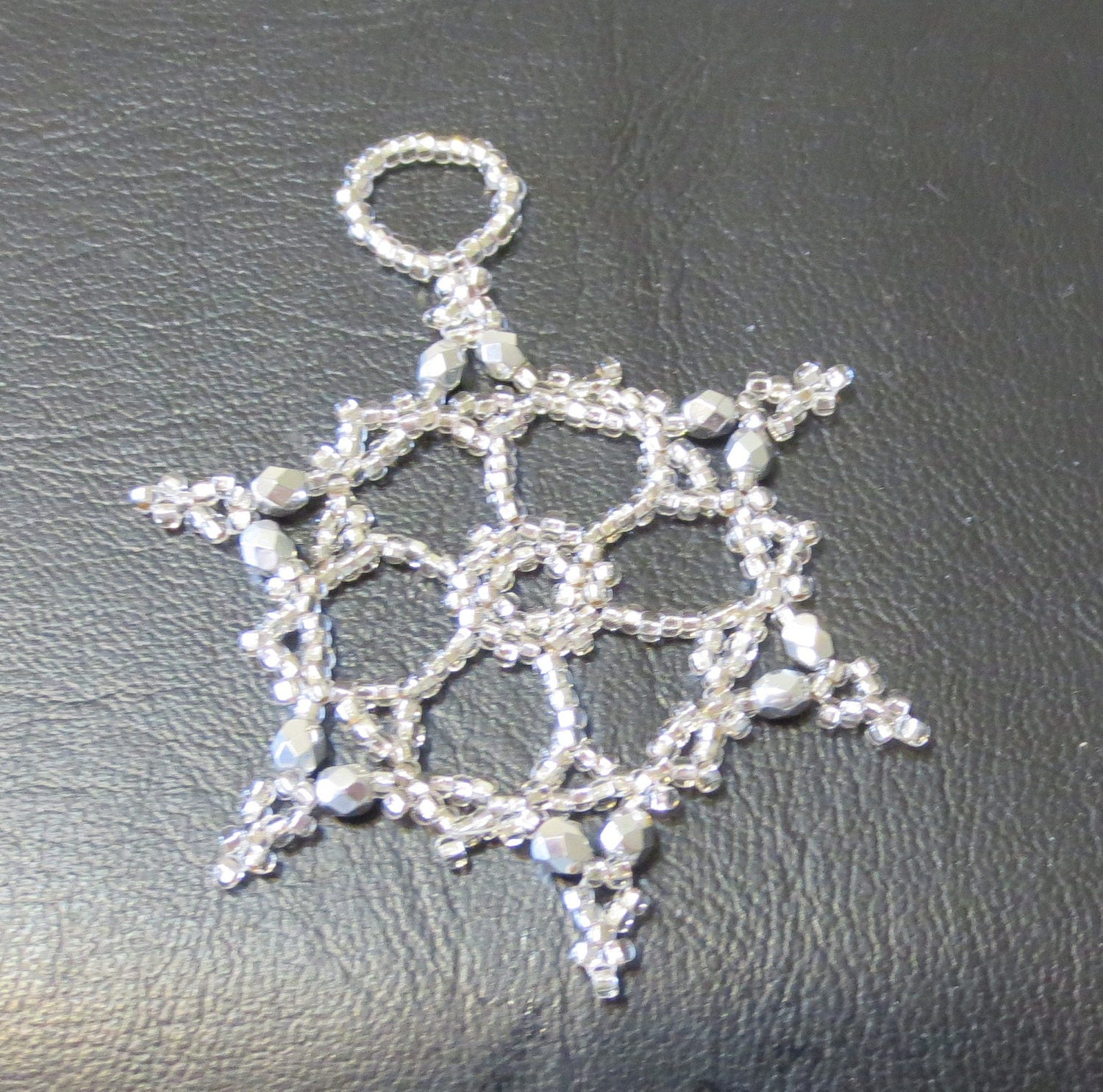 Bead and crystal snowflake / wreath ornament.