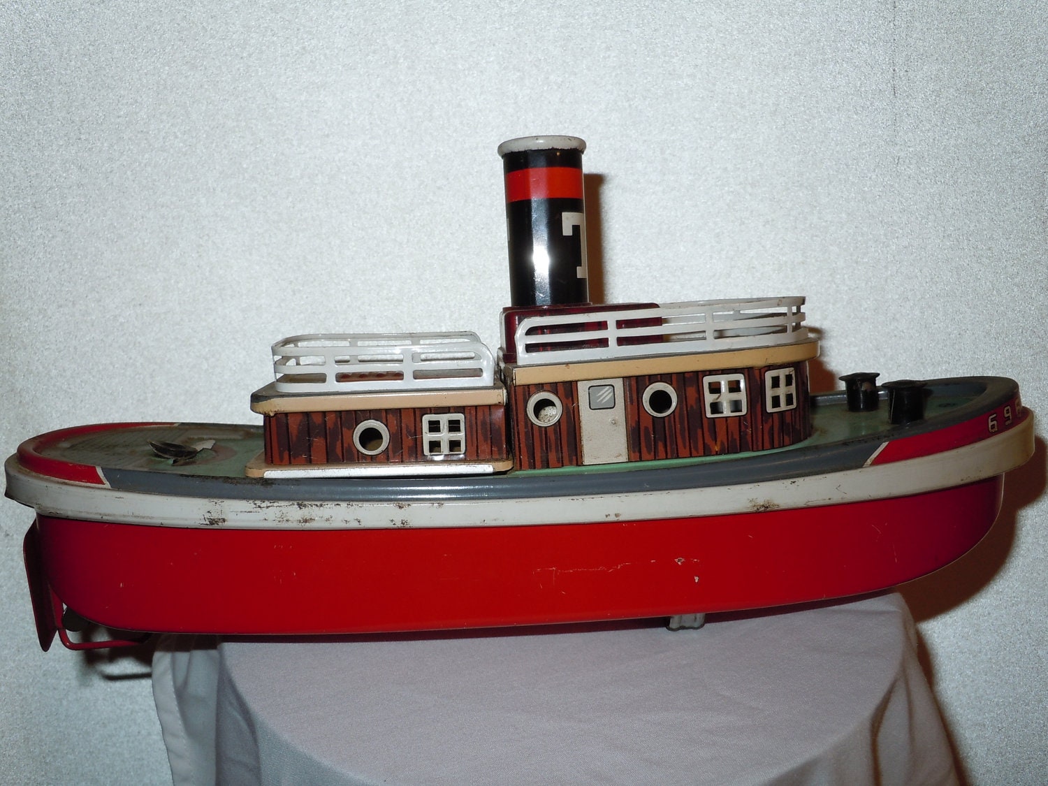 Vintage old metal Toy Boat Made in Japan New York tugboat