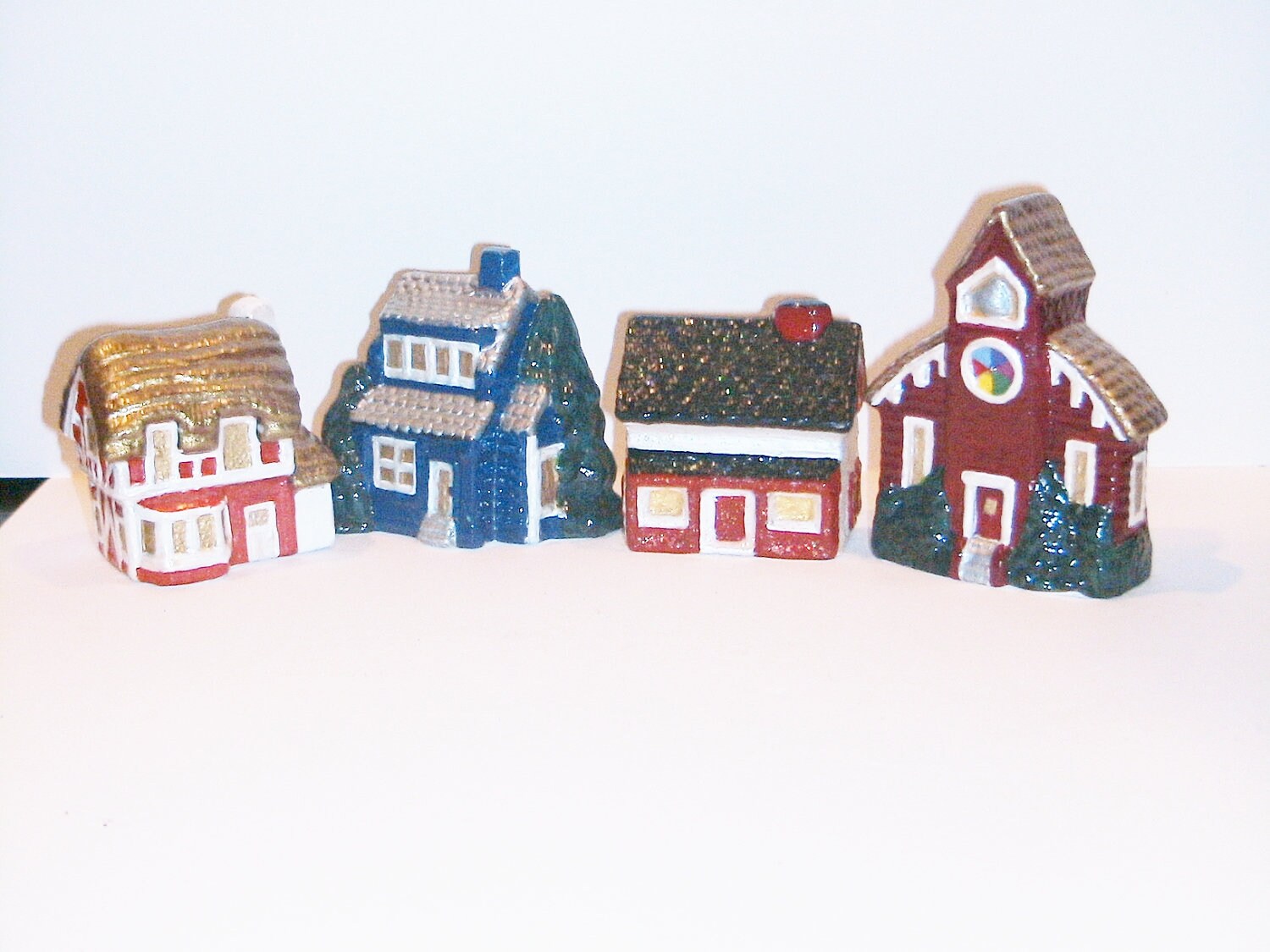 Set of Four Hand painted Miniature Ceramic Christmas Village