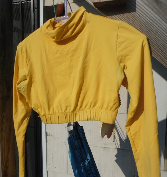 yellow longsleeve shirt