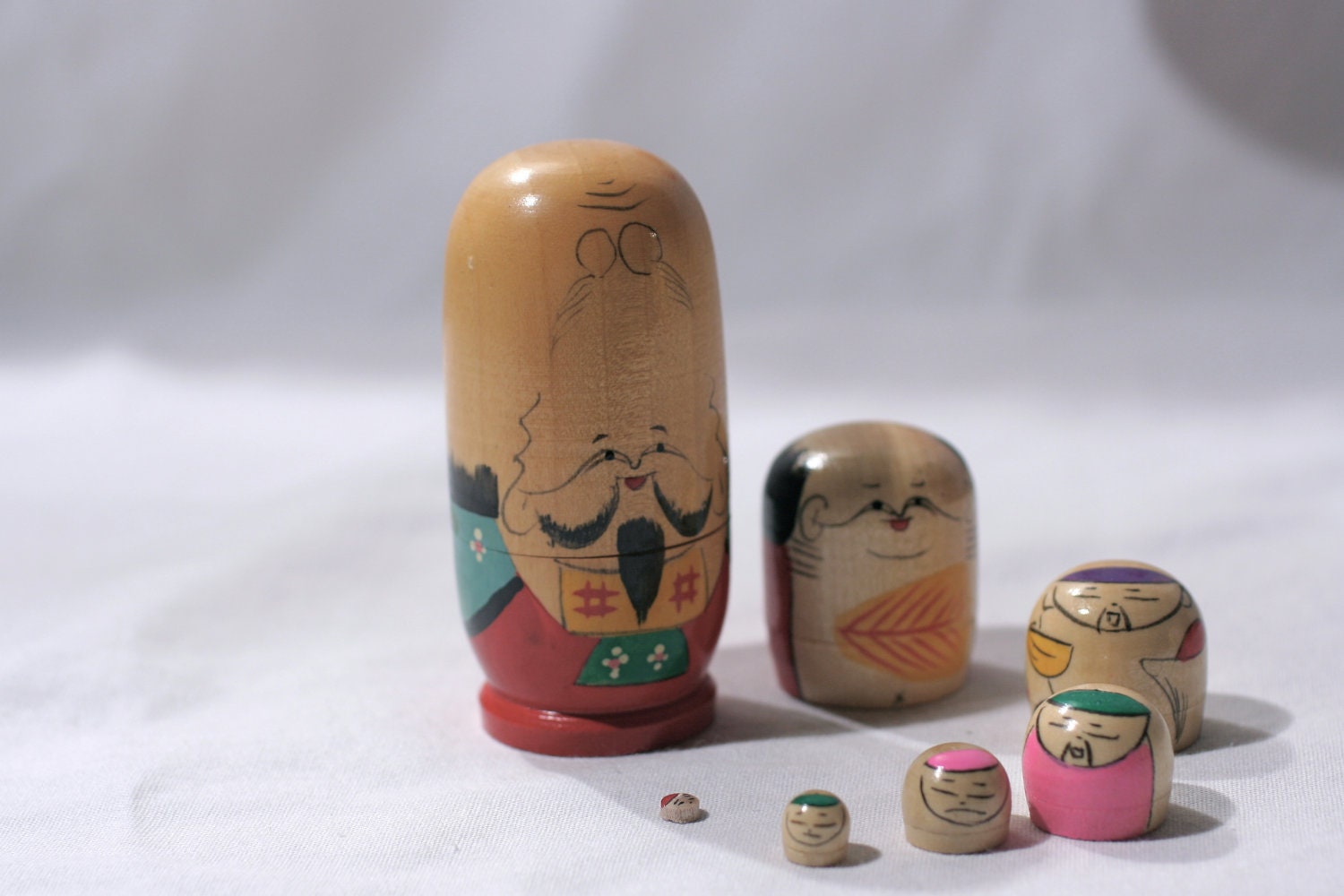 Vintage Japanese Wooden 7 Piece Nesting Doll by raggedrustyvintage