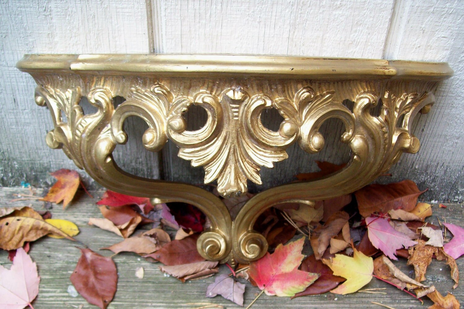 Vintage ornate gold shelf Italy
