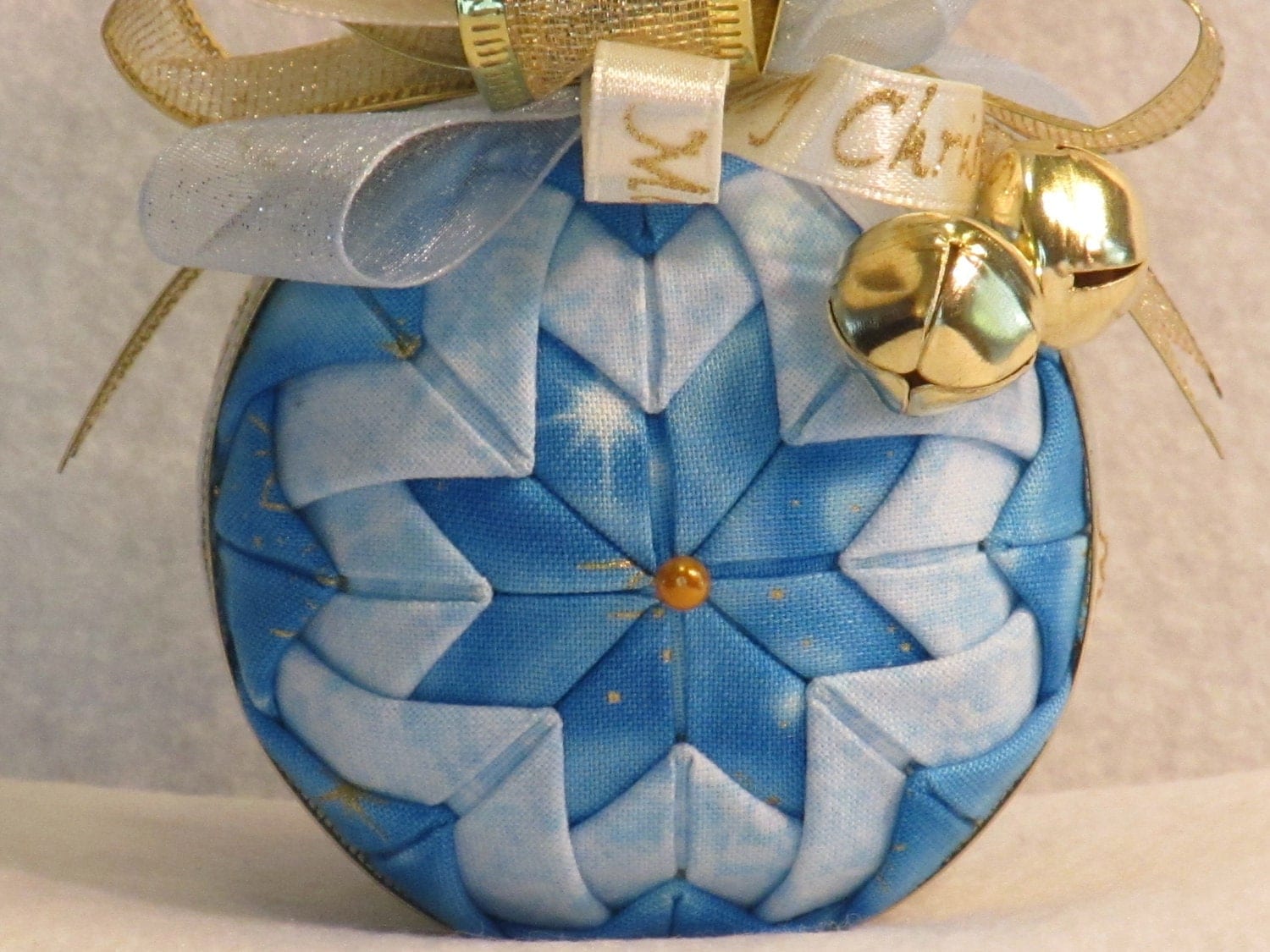 Quilted no sew fabric Christmas ornament ball icy blue and