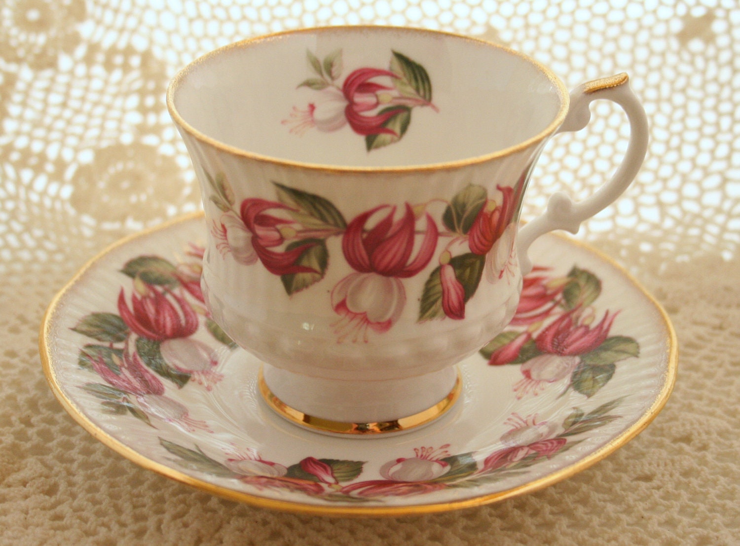 Elizabethan Tea Cup and Saucer Floral design with Gold Trim