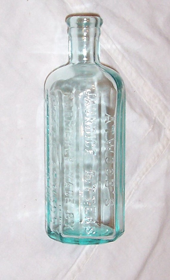 Vintage Atwoods's Jaundice Bitters Light Aqua Blue Bottle