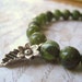 green garnet bracelet Hill Tribe leaf flower charm sterling silver 8mm natural gemstone stretch womens jewlery Fall jewlery