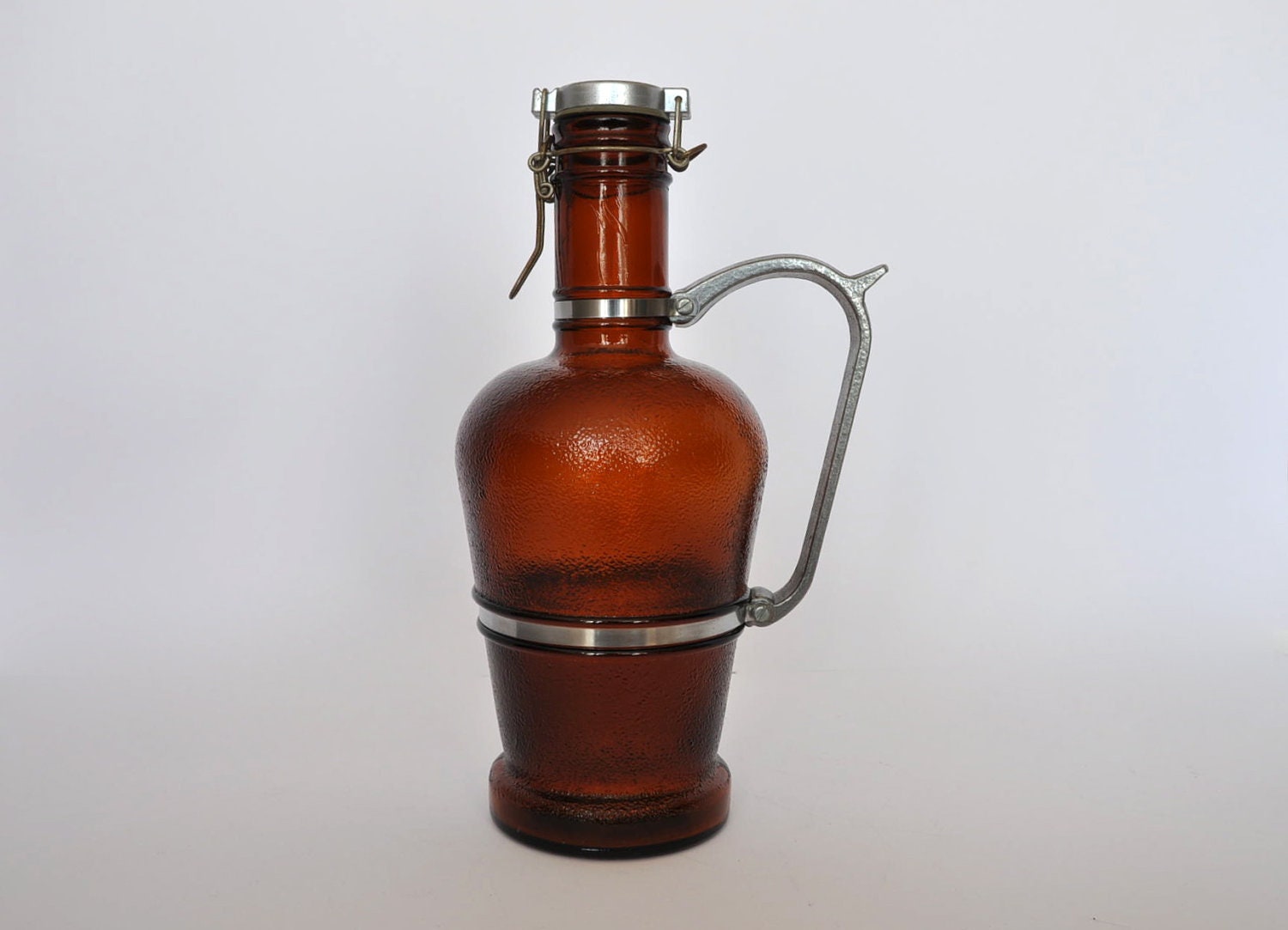 Vintage German Beer Growler with metal handle and metal lid.