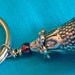 Eye Bead Bell Charm counteracts road gremlins or goblins