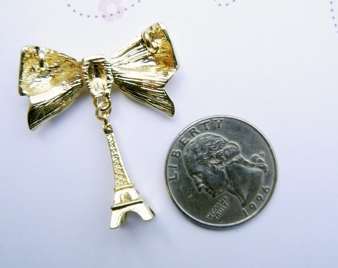 Gold-tone Bow and Eiffel Tower Pendant Rhinestones