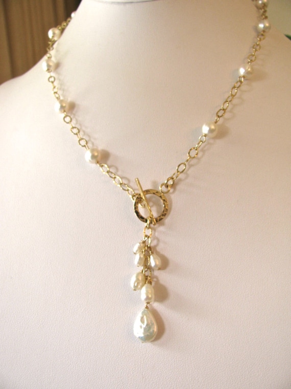 Items similar to White Pearl Gold Toggle Necklace on Etsy