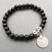 Mens black wooden beaded bracelet with double tibetan silver skull beads and silver plated ottoman charm