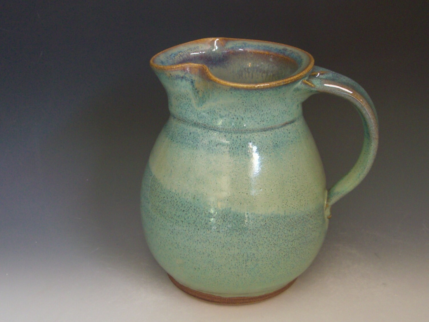 Hand thrown stoneware pottery pitcher