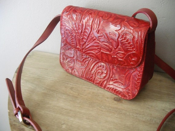 red tooled leather purse