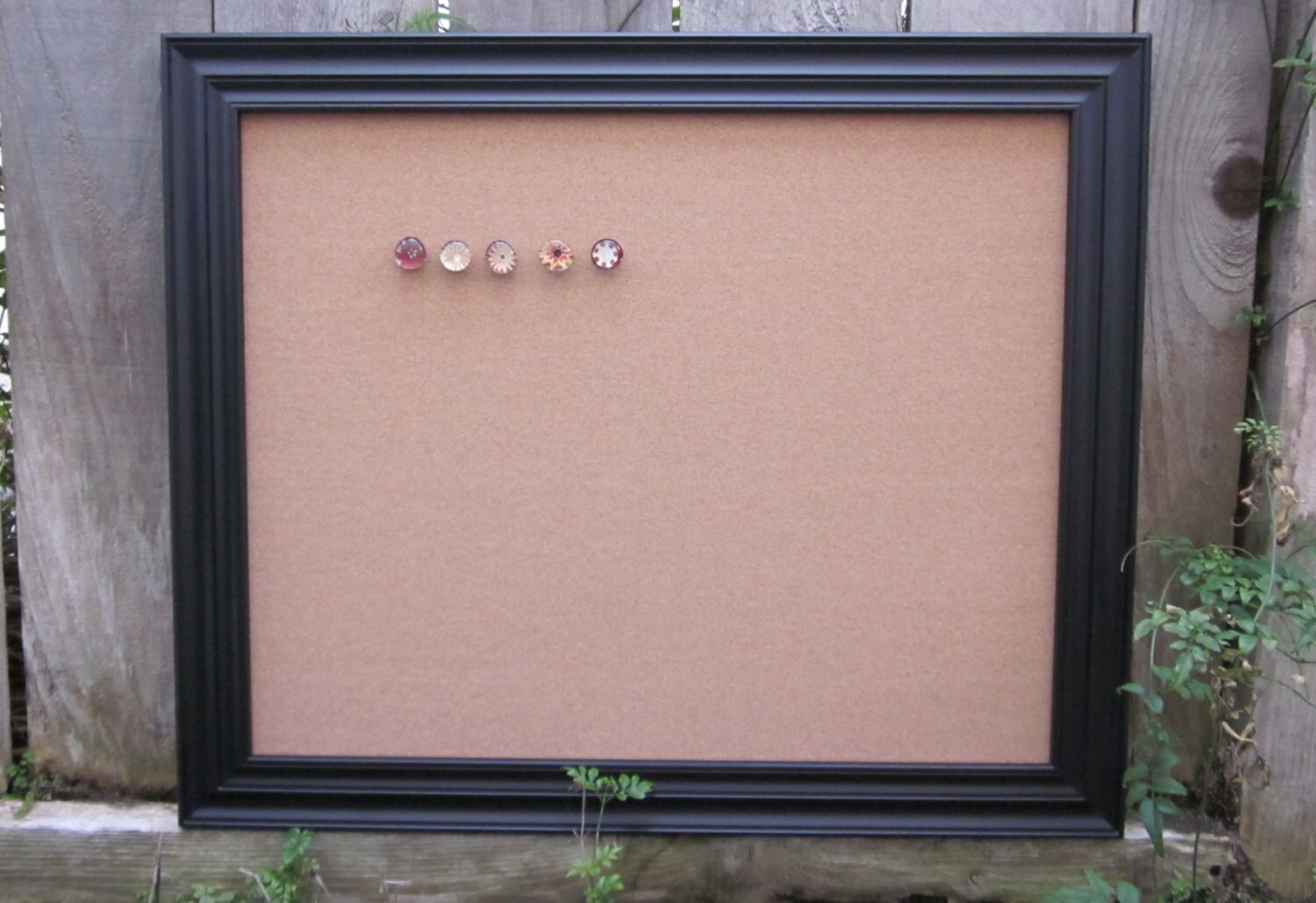 Black framed cork board