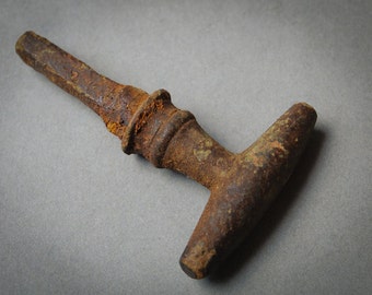Vintage metal pull handle. Very old. dark patina.
