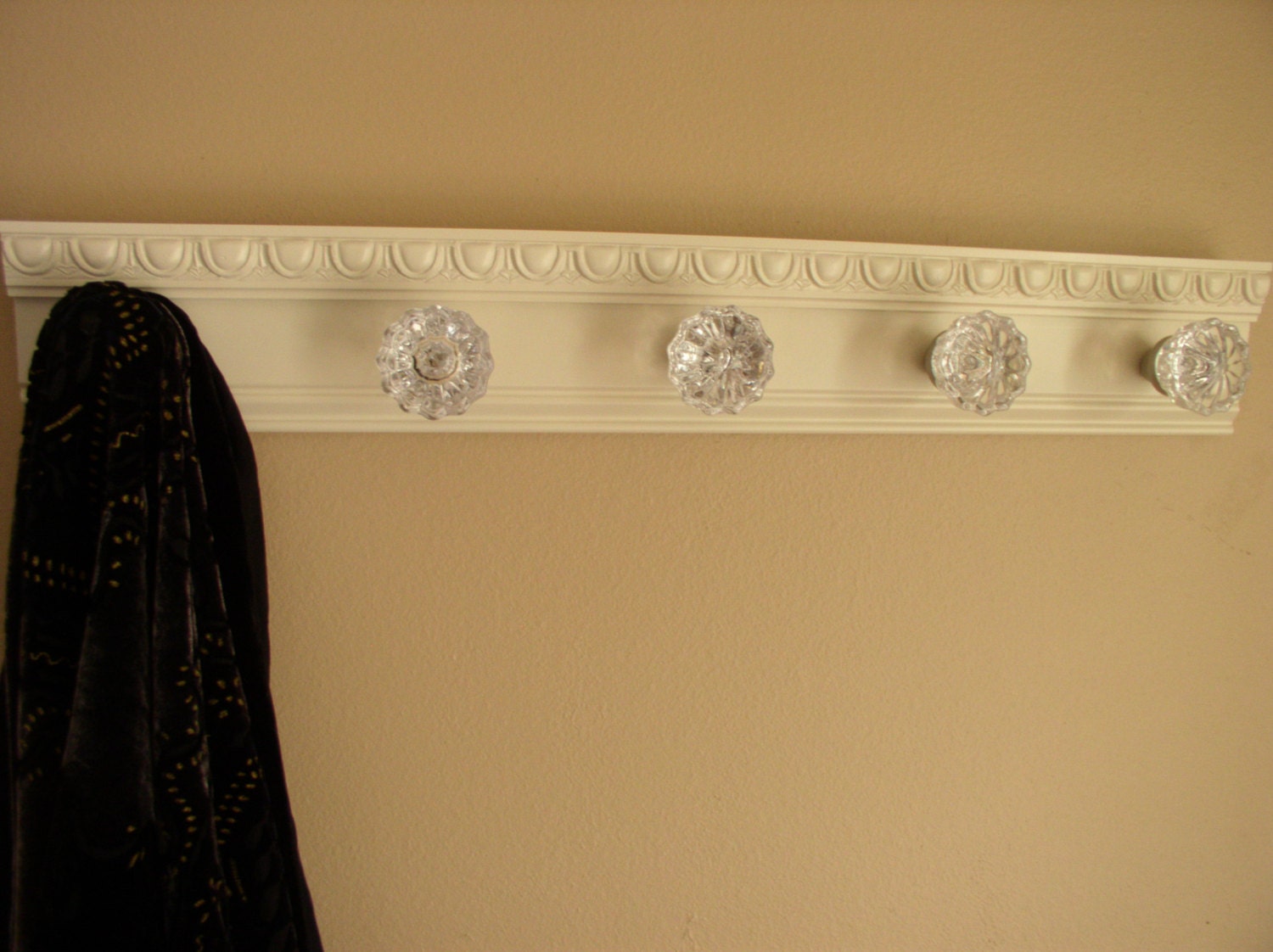 coat rack w/ 5 glass door knobs and decorative beveled